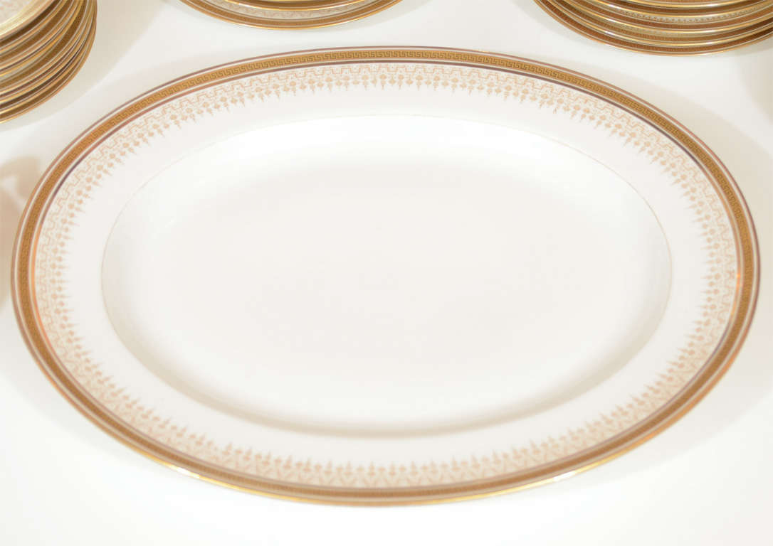 This gorgeous Desert service for 8 features a platter and two covered serving pieces. Eight medium desert plates ,eight larger desert plates eight small fruit or ice cream bowls and eight smaller plates for cookies. This set has a Classical greek