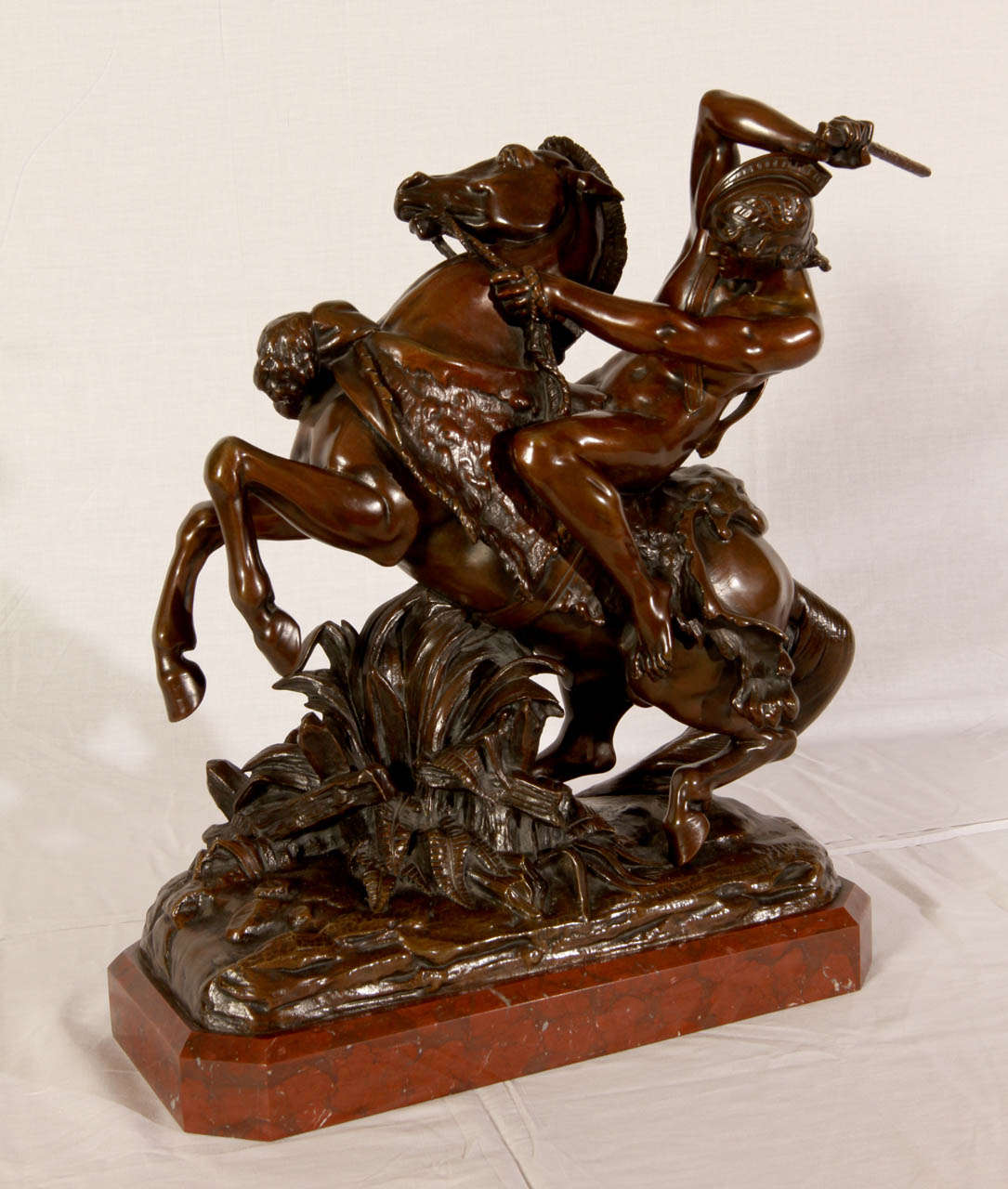 1840 brown patina bronze sculpture by 'Jean-Jacques Feuchere'. Red marble base. Good condition. Normal wear consistent with age and use.