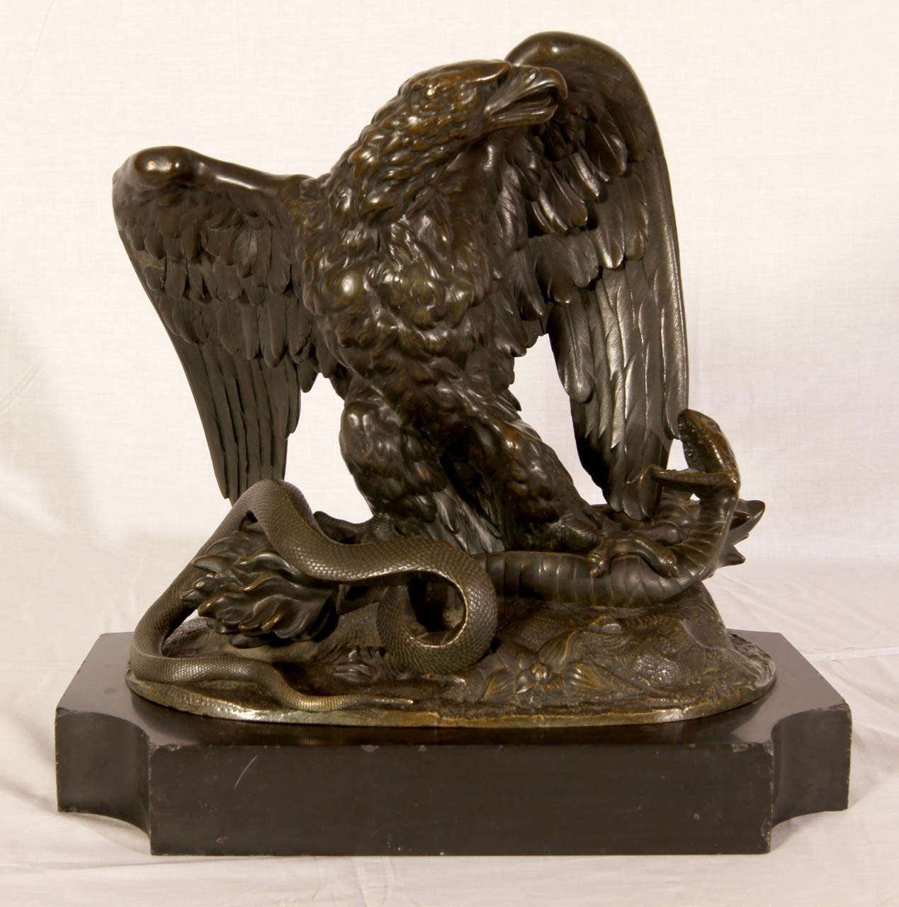 19th Century bronze with brown patina sculpture 'L'Aigle au serpent' (The eagle and the snake). Good condition. Normal wear consistent with age and use.