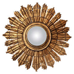 An Italian Carved and Gilt Wood Sunburst Mirror