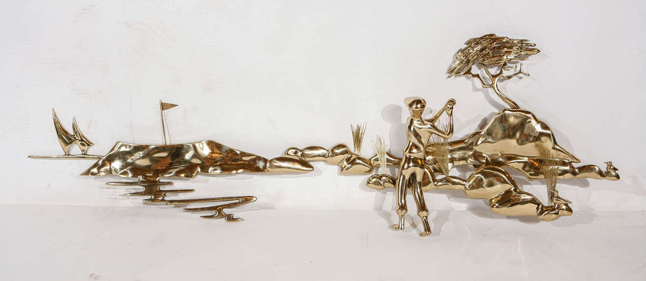 An expressive brass wall sculpture by Bijan, signed and dated 1980. Most likely depicting the gold course at Pebble Beach near Carmel, California with the cypress pine on cragged rocks and sailboats. Sculpture is missing the golf club in the