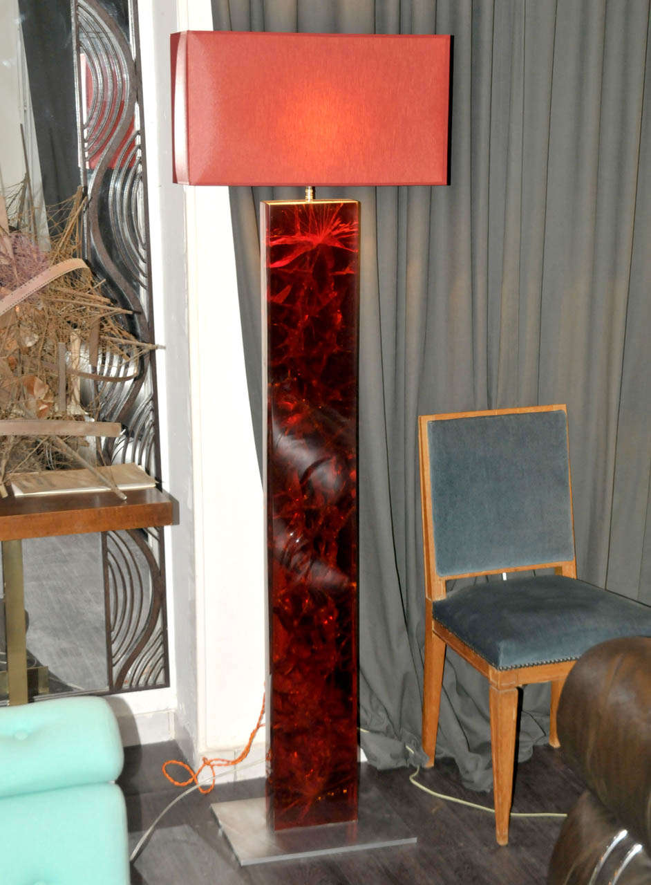Pair of 1980's floor lamps in red resin with a steel base. New shade. Wired for European use.  Good condition. Normal wear consistent with age and use. 

Dimension: Height 175cm x Width 55cm x Depth 30cm.
Dimension: Height 150cm x Width 40cm x