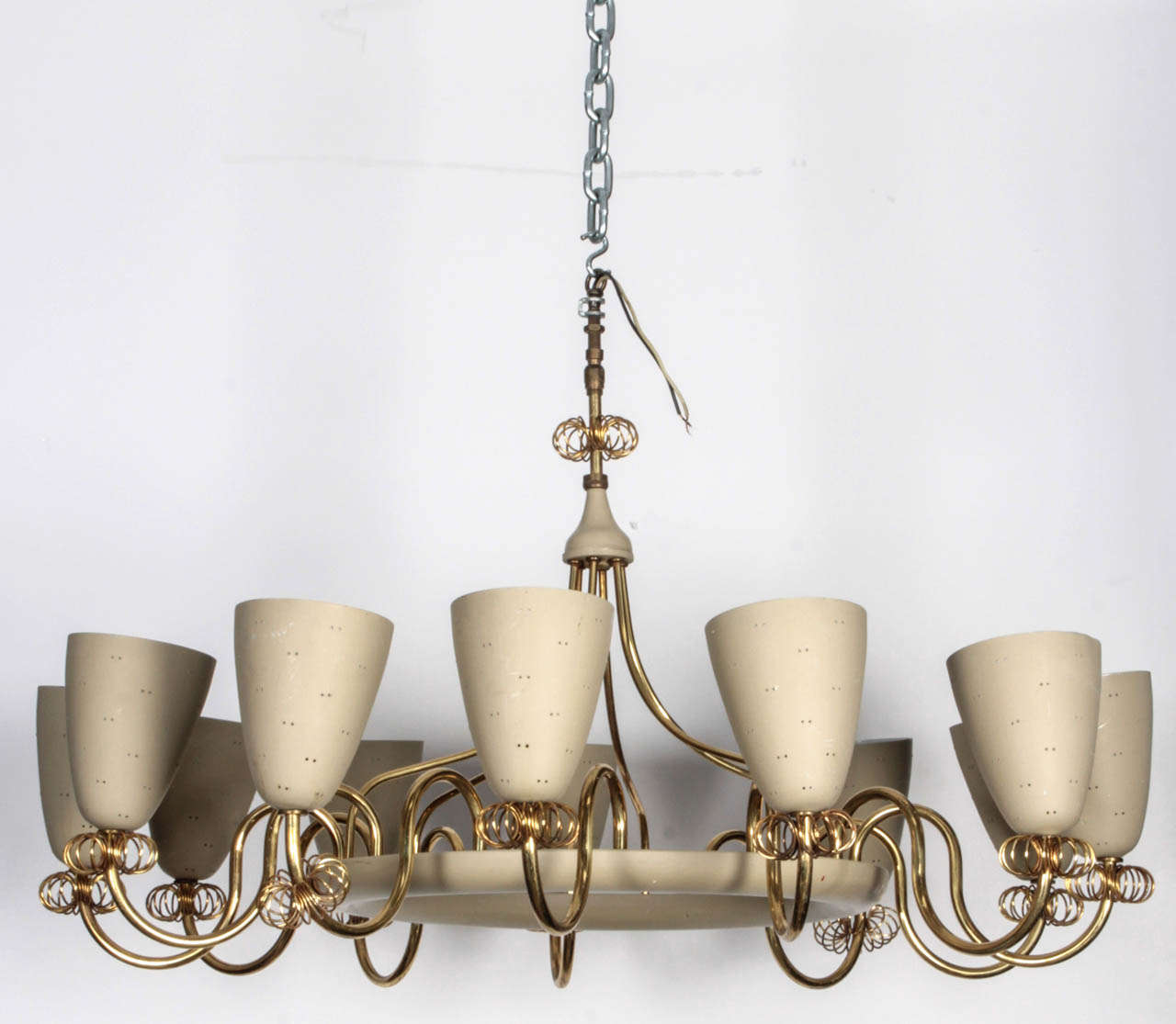 Twelve lights Chandelier by Lightolier 
Enameled metal body with brass detailing retained it's 
cream-beige colour in matte finish.
Matching chandelier available.