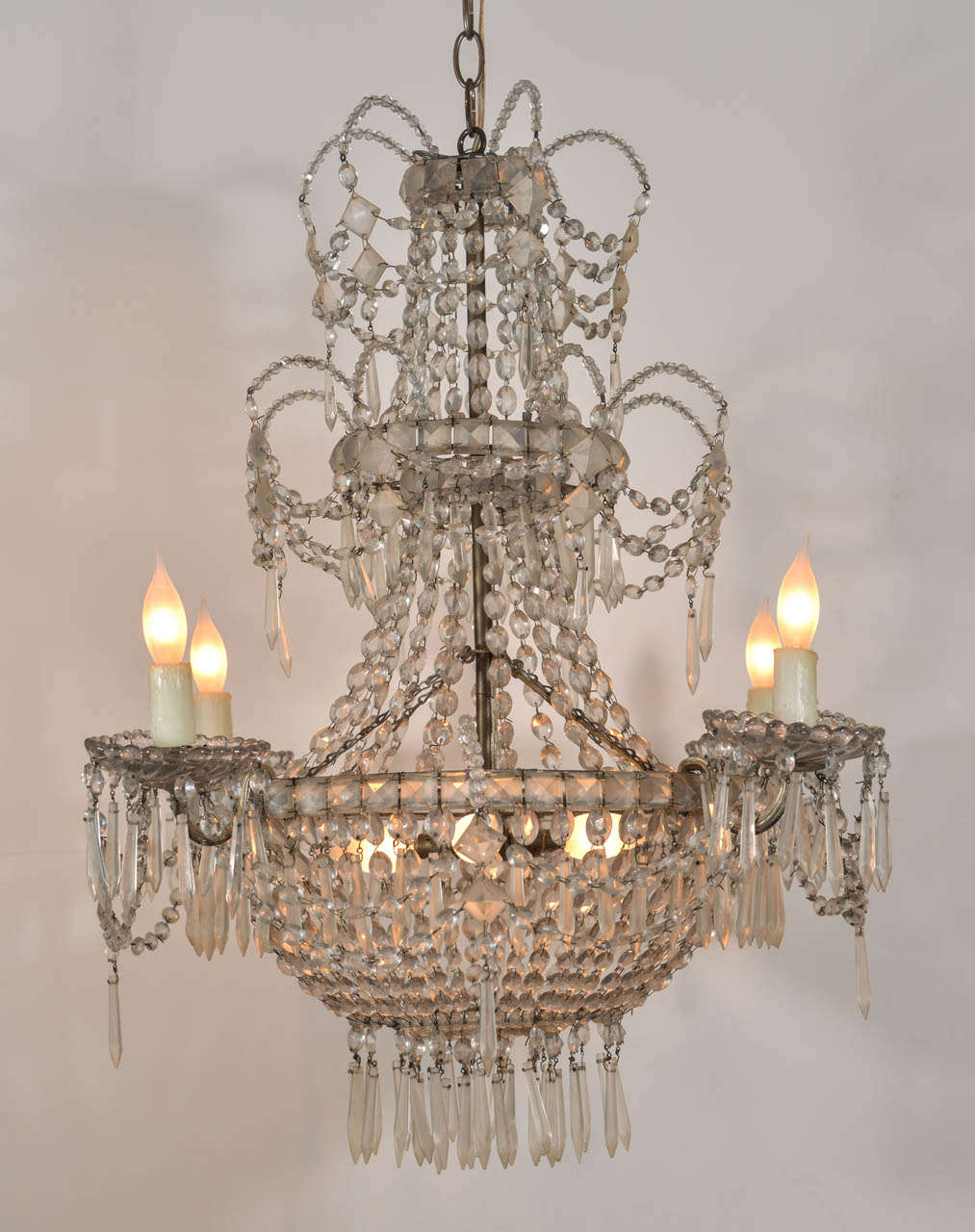 Seven-light crystal three-tier chandelier, created circa 1860-1880 attributed to the Royal Factory of glass and crystal of La Granja (Real Fa´brica de Cristales de La Granja) in San Ildefonso, Sergovia, Spain. This cut-glass chandelier is newly