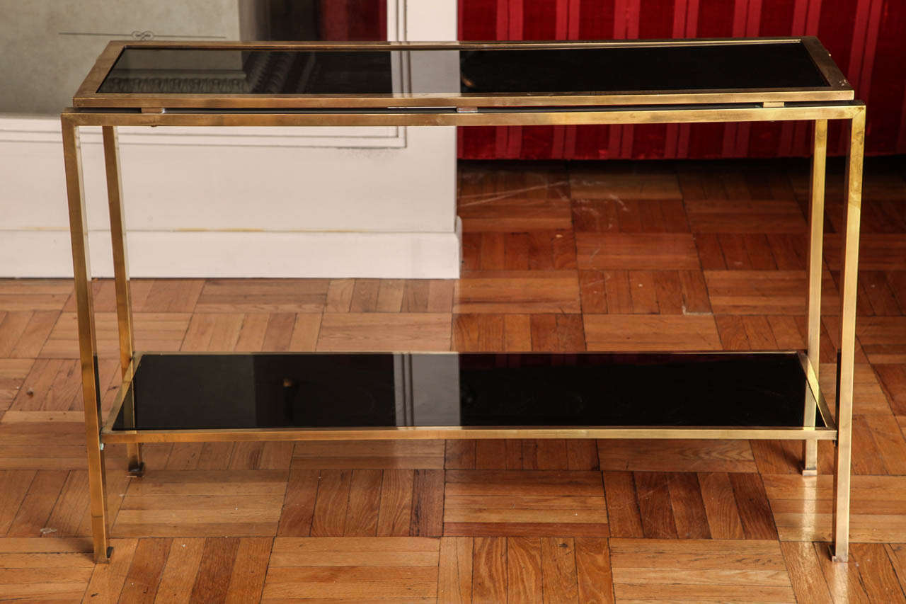 French A Two-Tier Brass and Black Glass Console Table, France c. 1970