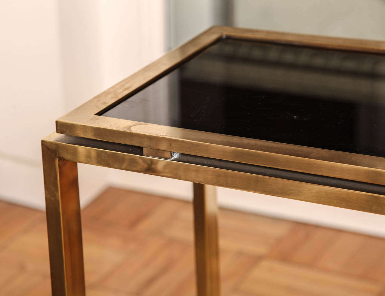 A Two-Tier Brass and Black Glass Console Table, France c. 1970 3