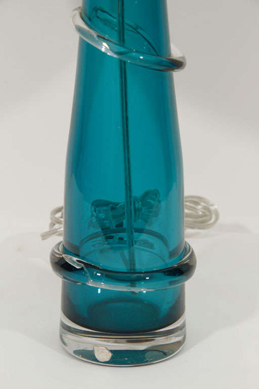 Exceptional pair of Sea Blue/Green Lamps with  clear glass rings by Carl Fagerlund for Orrefors.