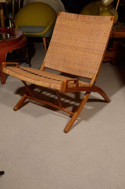 Woven cane folding chair with handles and wooden frame by Hans Wegner, Scandinavian, c. 1950