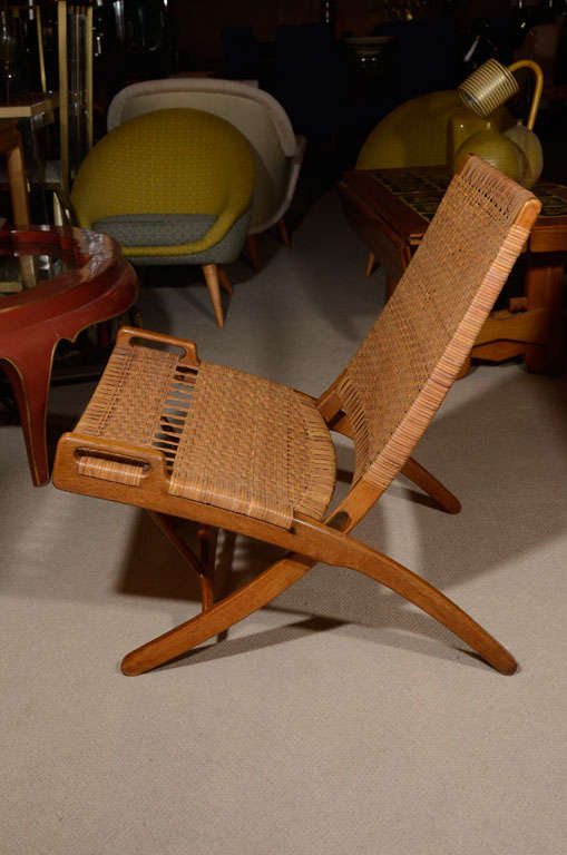 Woven cane folding chair by Hans Wegner 1