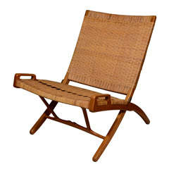 Woven cane folding chair by Hans Wegner