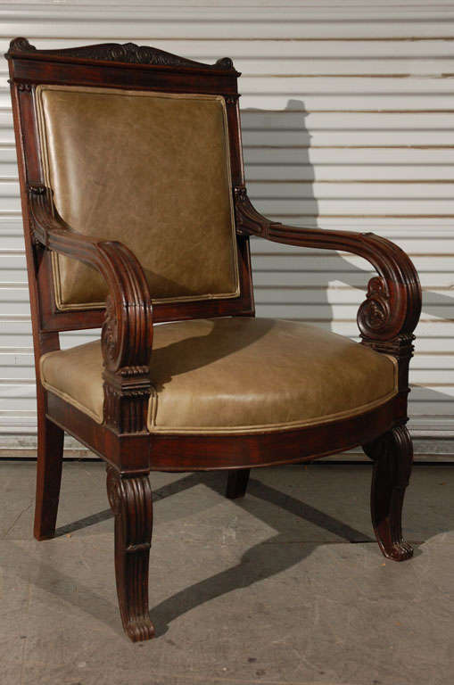 Rare carved rosewood armchair with green leather upholstered seat & back, 19th C.