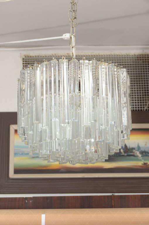 Very pretty, classic Camer crystal chandelier. The round form is accented by staggered crystals on the perimeter. Another plus is the scale; it is not as big as many in our collection and is quite versatile.  Please contact for location.