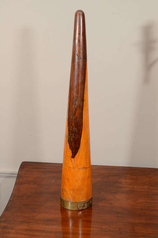 Sailor's fid made of lignum vitae and brass. Once an indispensible tool on tall ships, the fid was used to work rope and open holes in a canvas sail.