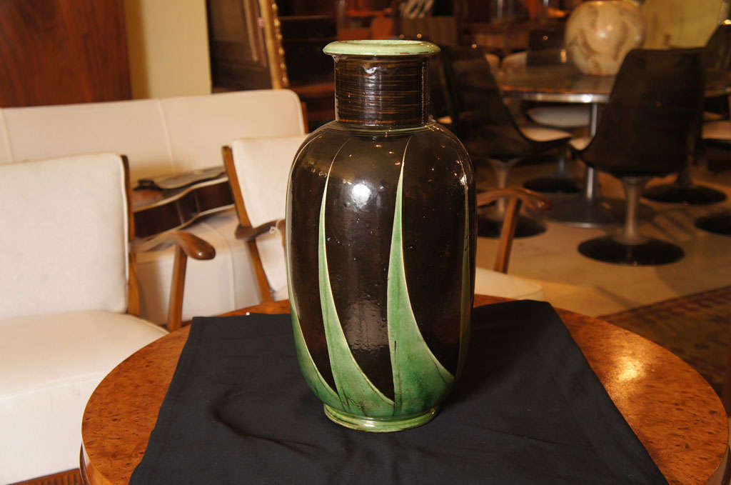Tall vase from the Kaehler Pottery factory in Naestved, Denmark, in striking black and green art deco design, likely by Nils Kaehler.