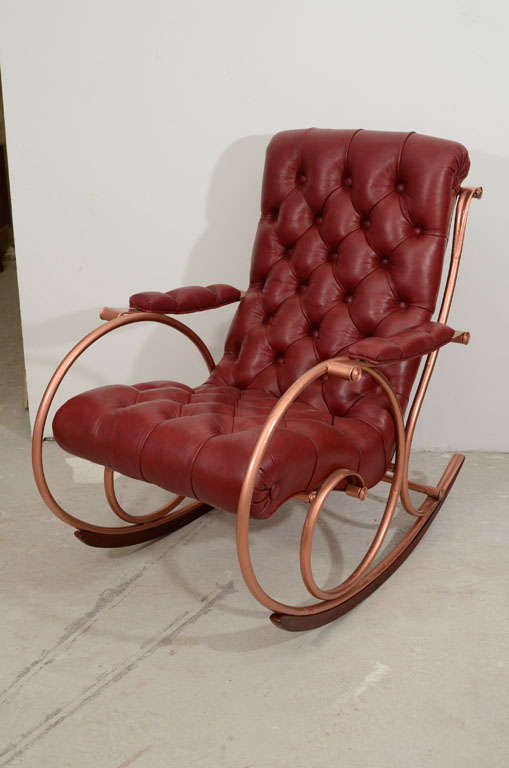AMERICAN EBONIZED, BRASS AND UPHOLSTERED ROCKING CHAIRS, 
BY LEE WOODARD & SONS, LATE 19TH/EARLY 20TH CENTURY