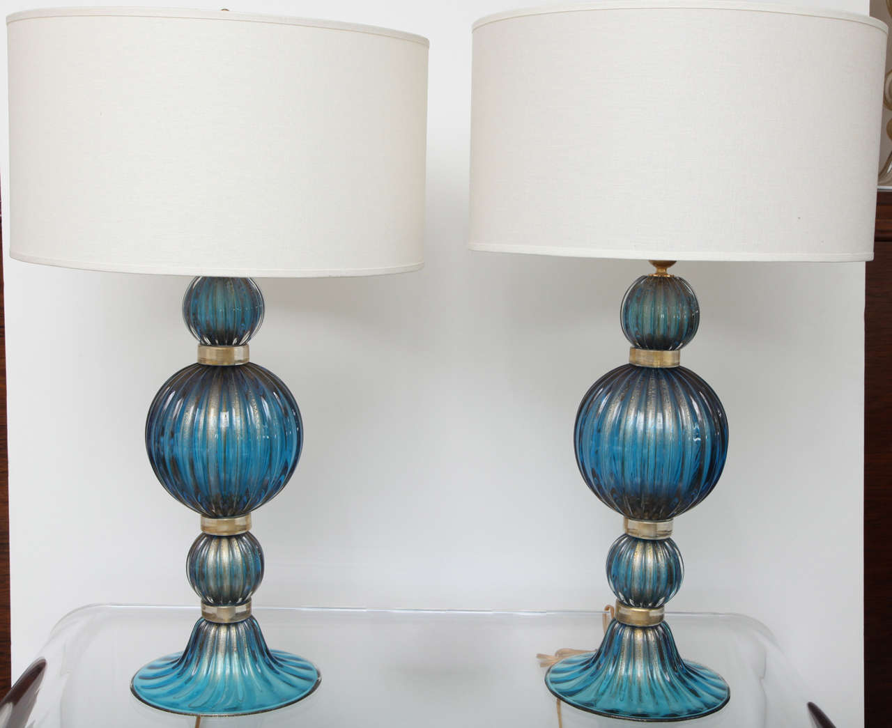 These lamps make quite a design statement! Beautiful pair of handblown Italian Murano cobalt blue glass lamps with 