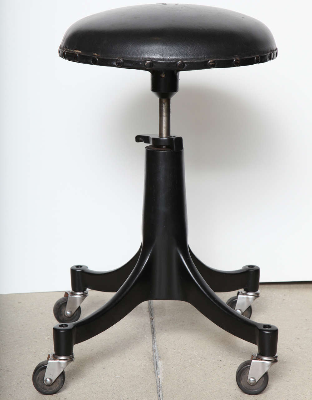 Industrial Pair of Bausch & Lomb Black Metal Counter Height Stools