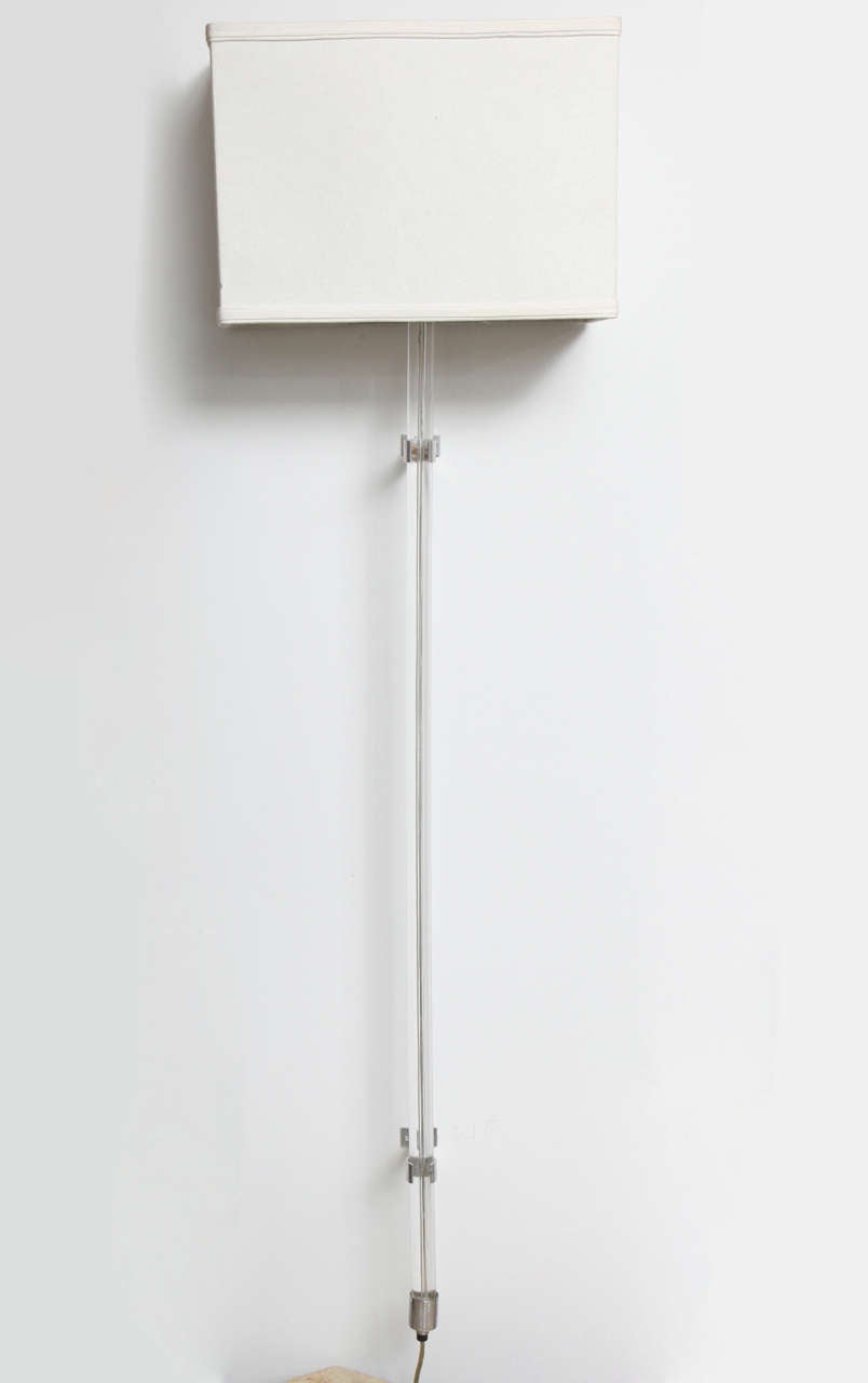 Wall-mount lamp / sconce with Lucite stem and brushed metal hardware by Peter Hamburger; made by Kovacs for Knoll International.  Includes white linen rectangular shade.  USA, circa 1970.  Rewired for U.S.; takes one standard bulb, 75 watts