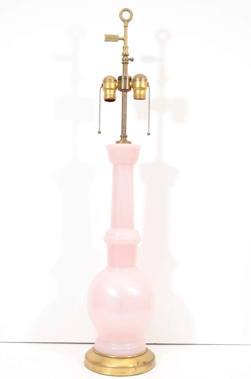A pair of vintage Italian table lamps in light pink Murano glass with brass bases. The items are in good vintage condition with age appropriate wear; some scratching.

Reduced from: $3,600