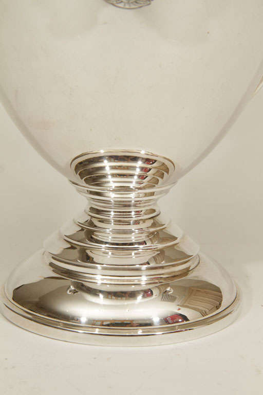 Sterling silver trophy with removable lid and mascot handles, hallmarked, London, 1931