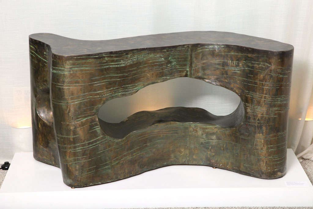 Amazing example of the high artistry that was often achieved in the studio of Philip & Kelvin LaVerne.  This piece is hand made of bronze, and one-of-a-kind.  Incredible sculptural form, can be used as is, or with a glass top as a console, dining or