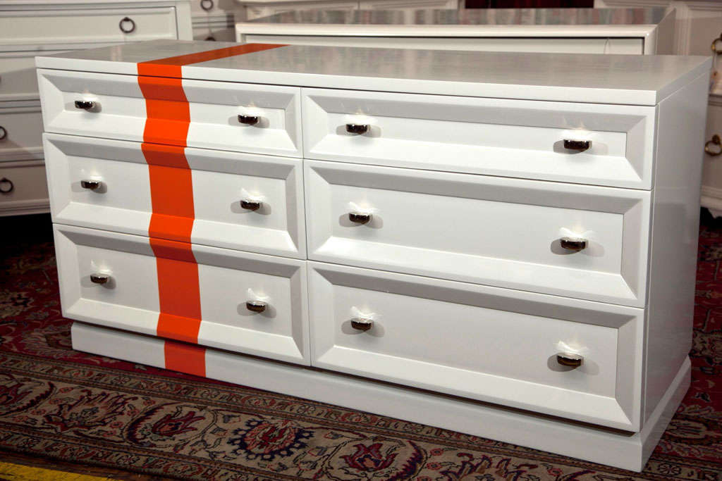Mid-Century double-dresser form chest in custom white paint with stripe.Oval lozenge chrome pulls.