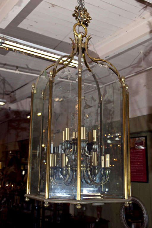 Bronze, beveled glass octagon shaped chandelier.
Two tier lighting-total of 18 lights.