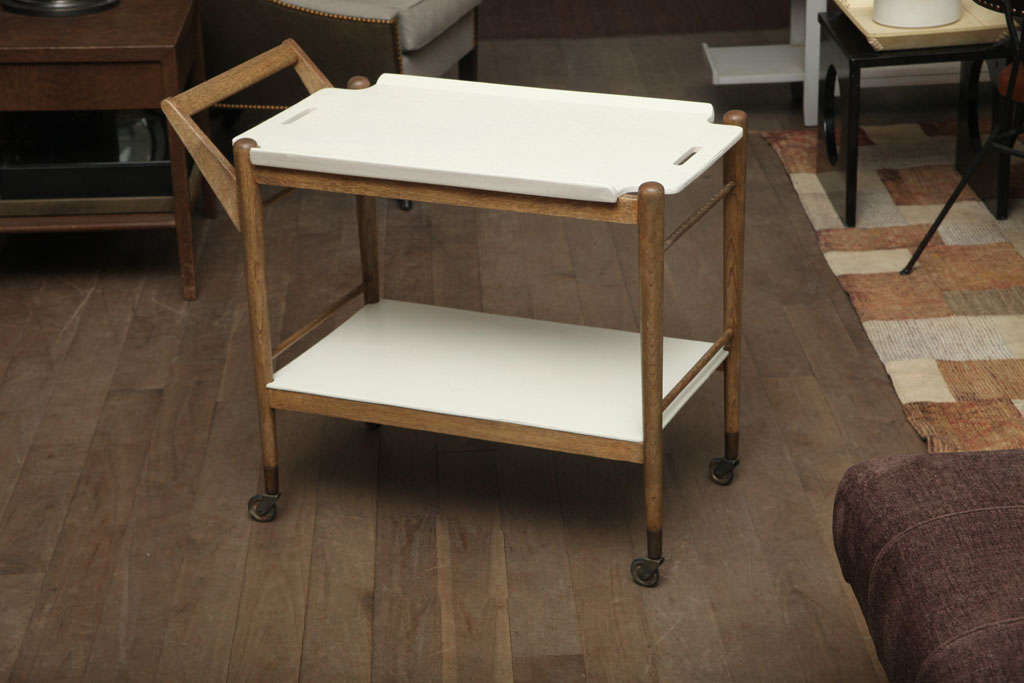 Translucent faun-finished oak serving trolley with whitewashed surfaces circa 1950
