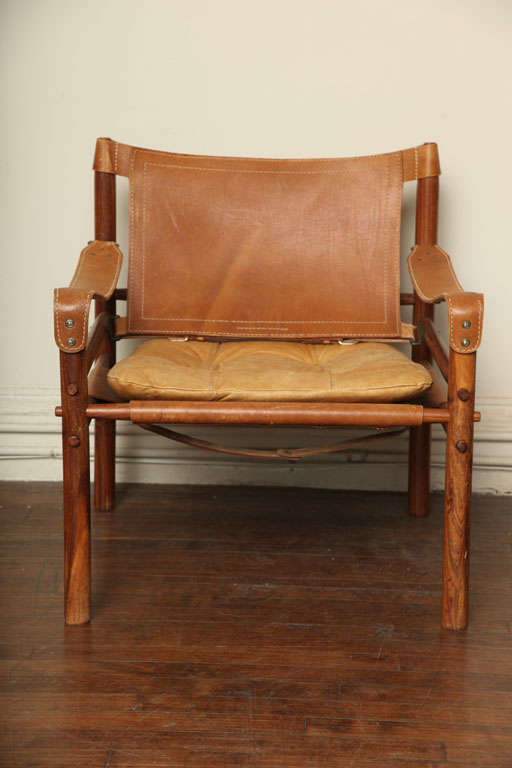 Rosewood frame with tufted leather seat