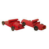 Pair of Red Toy Trucks
