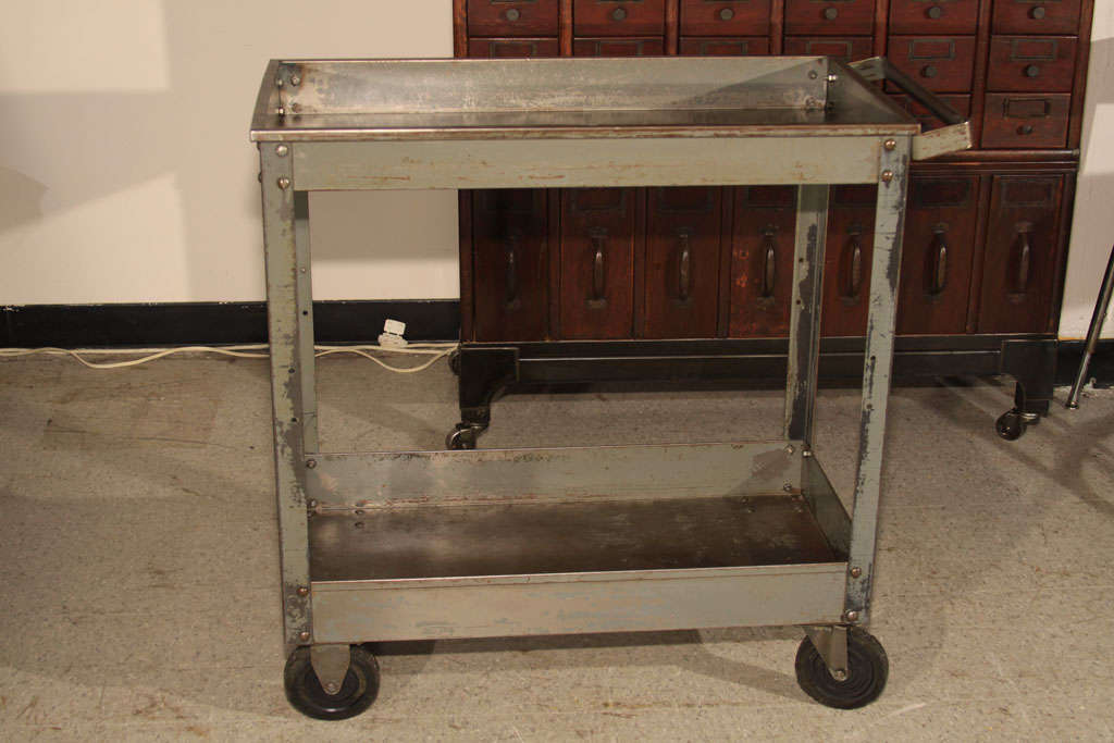 Rolling steel factory cart.  Excellent bar, side table, display, gardening, pool party/barbecue cart.