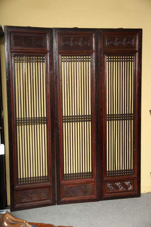 A set of six Chinese lacquered elmwood interior doors from the 19th century with original finish, perfect to be made into a screen. This set of six interior doors comes from China, where it was made with lacquered elmwood during the 19th Century.
