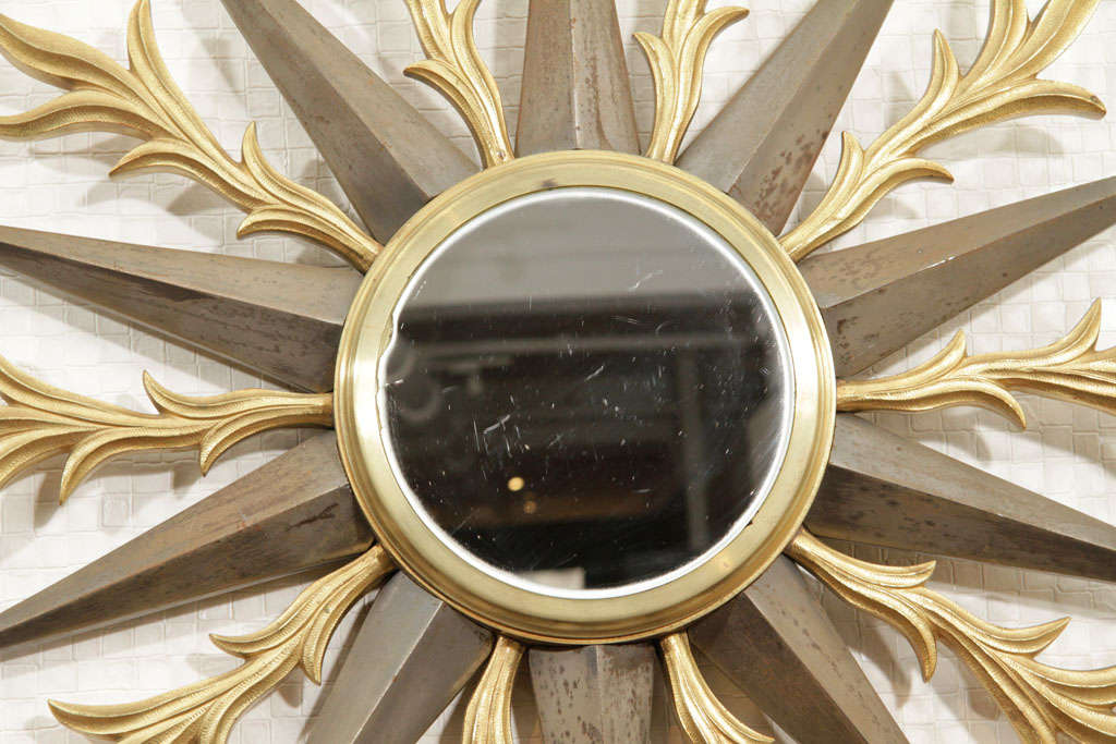 20th Century Sunburst mirror by Gilbert Poillerat