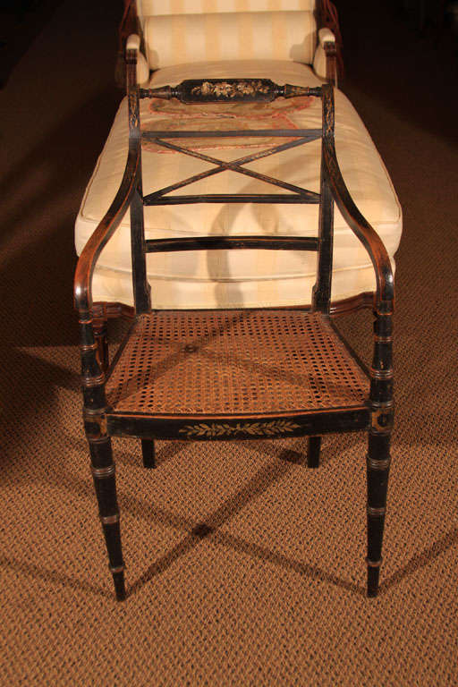 English Regency Arm Chair with cane seat

This is a fantastic chair due to its original paint and gilt. Over time the paint has worn on the arms which has created this wonderful petina.  The original paint on the upper crest rail is all