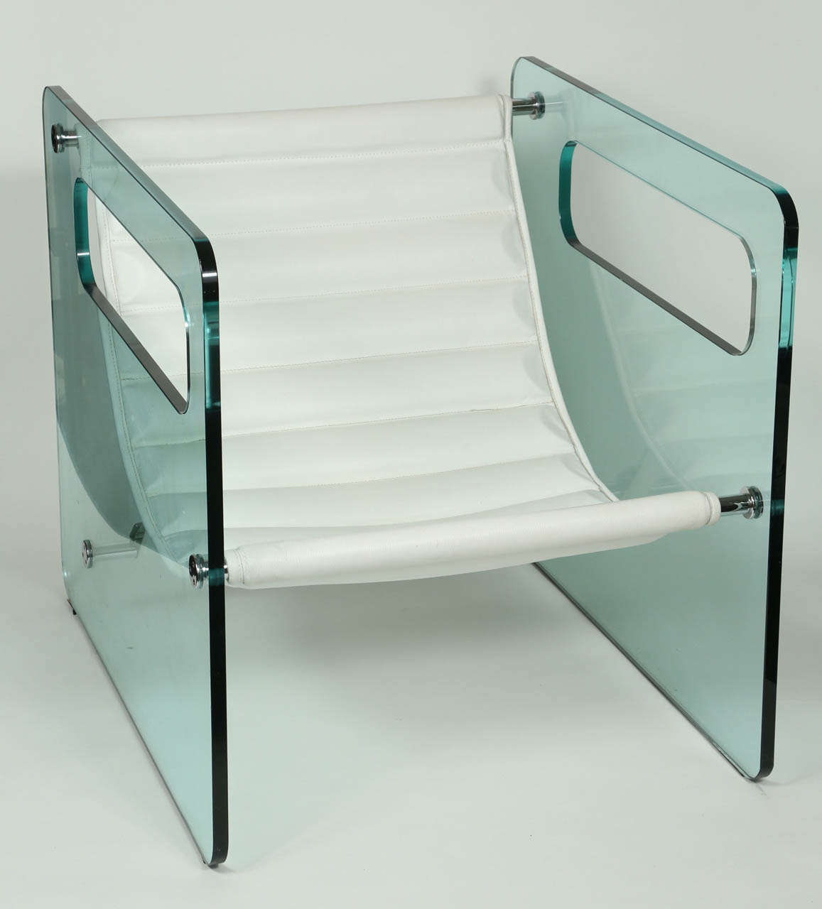 China white leather seat with 3/4 inch glass frame supported by stainless steel support rods.