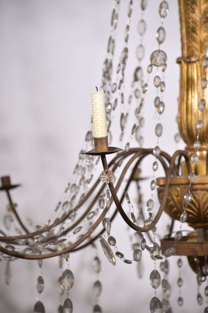 18 th century , Italian ( genoa )  gilded wood , iron and crystals chandelier In Fair Condition In Houston, TX