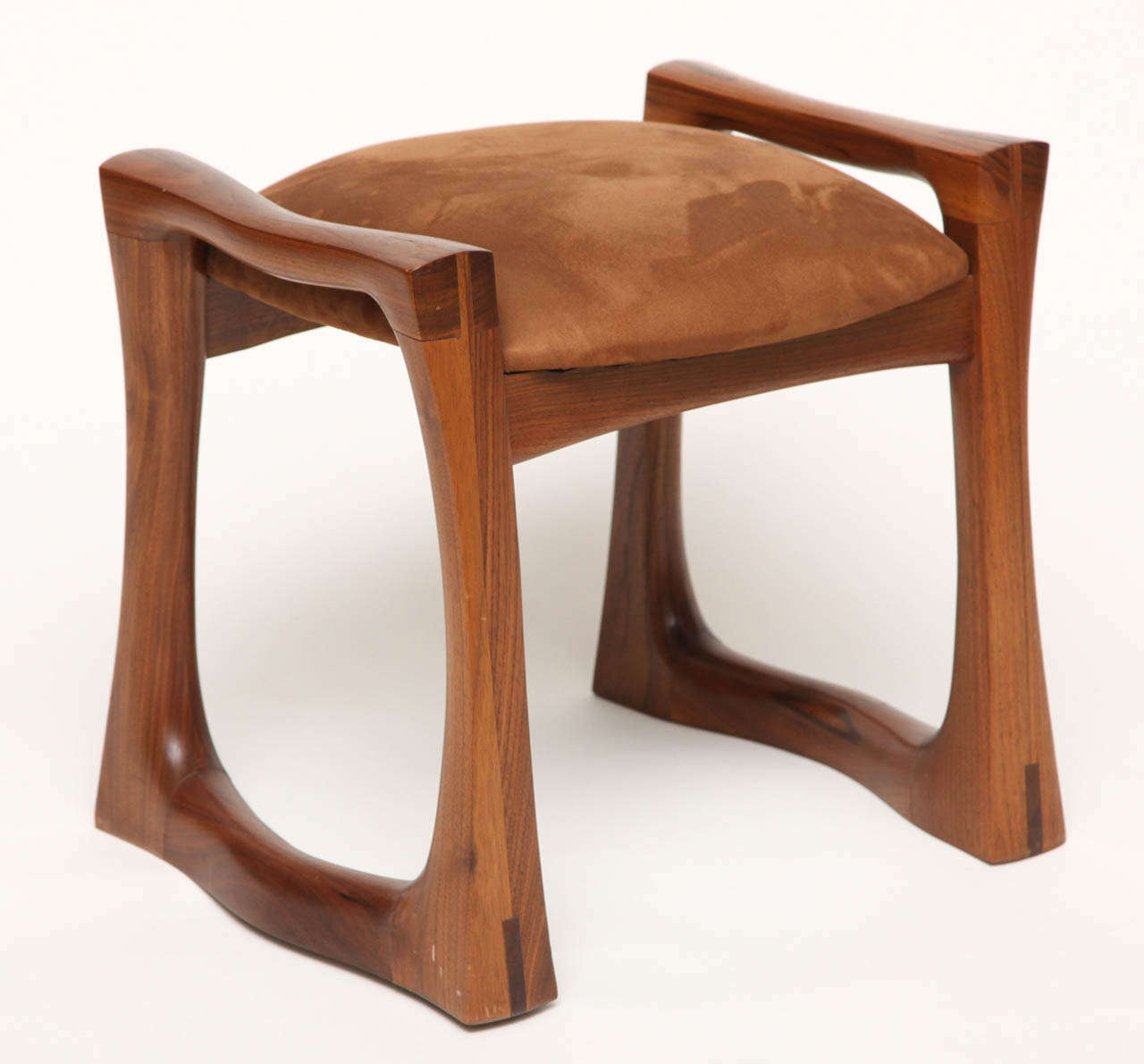 An American Studio stool in walnut.