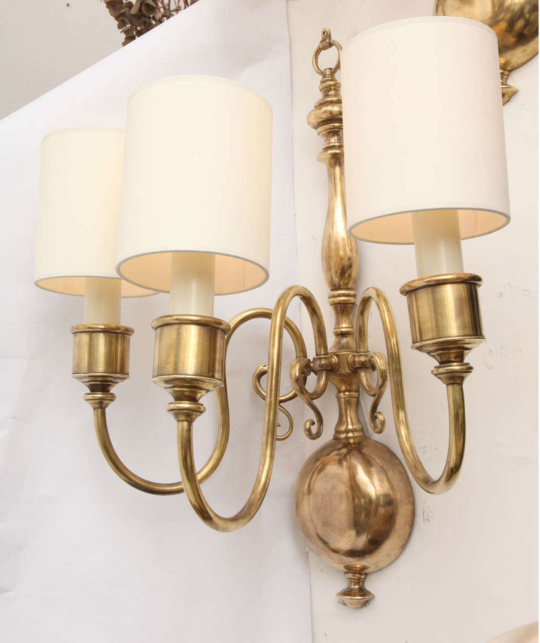 A pair of 1920s classical modern brass wall sconces.