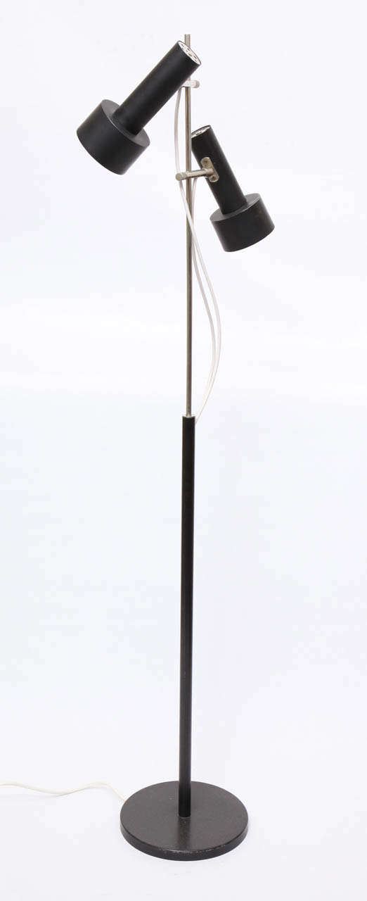 A 1950s Italian articulated floor lamp attributed to O-Luce.