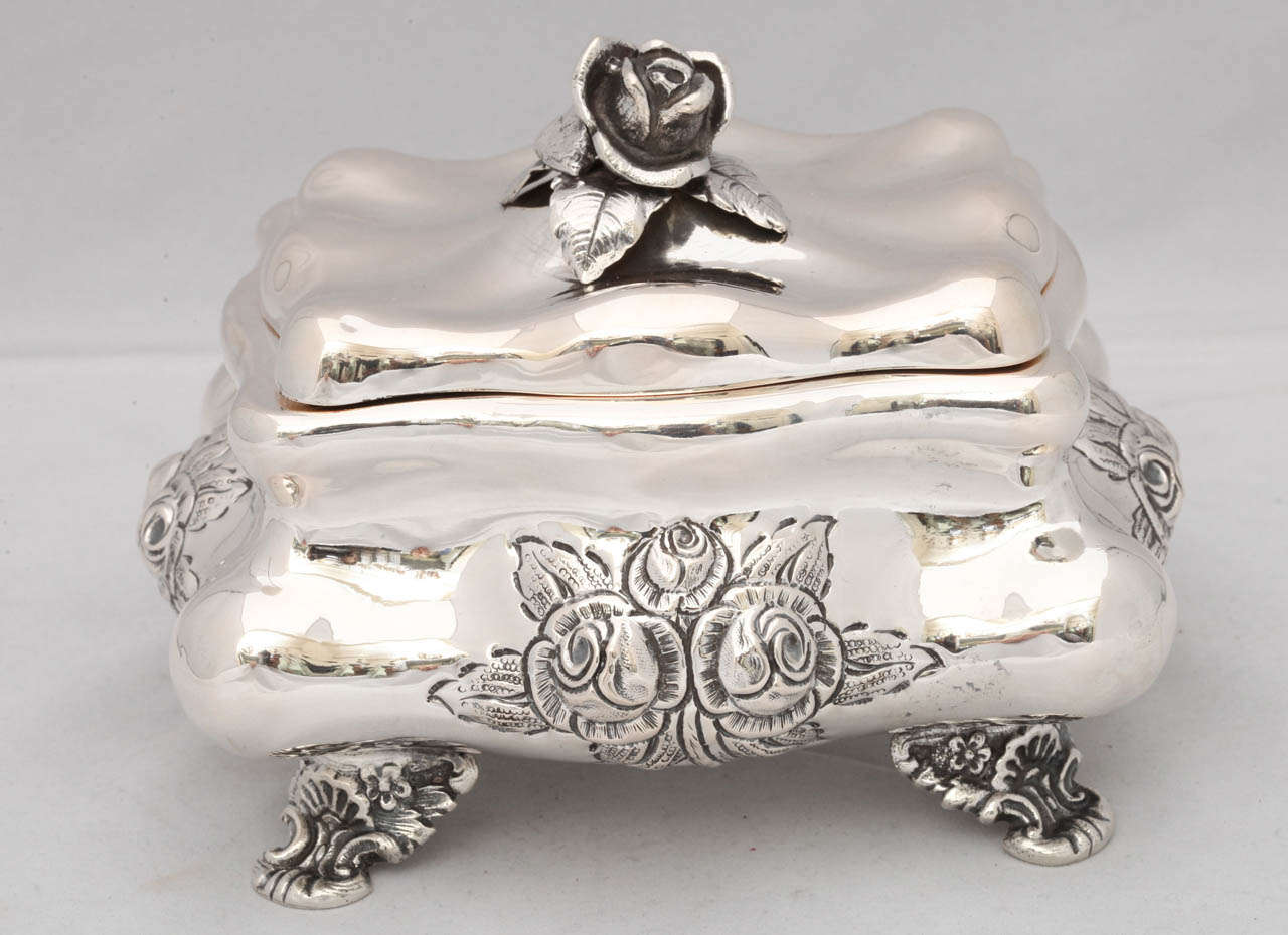 Continental (.800) silver, footed  box with floral finial, Austria, circa 1890s. Gilded inside. 5