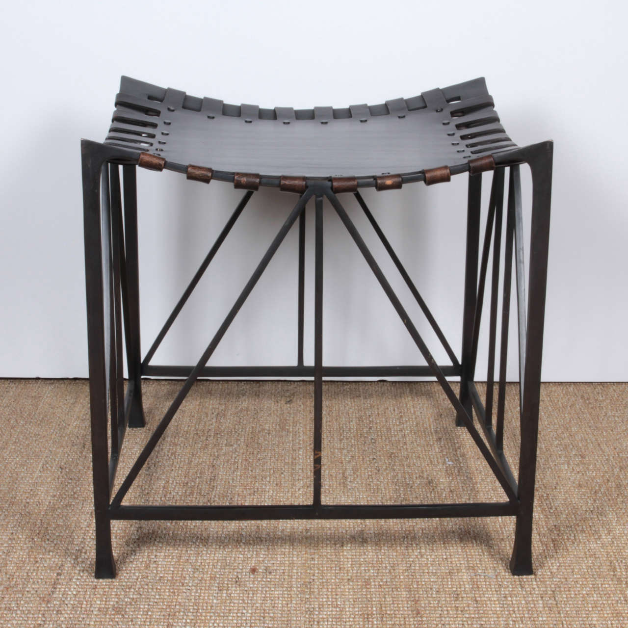 Contemporary bronze,
And leather stool.