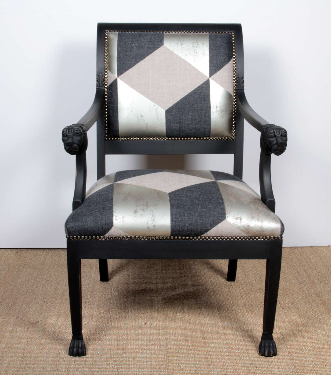 Black bergeres with black and silver upholstery.
