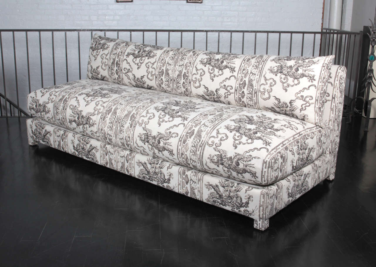 Antony Todd armless sofa upholstered in Jim Thompson hand-blocked fabric.