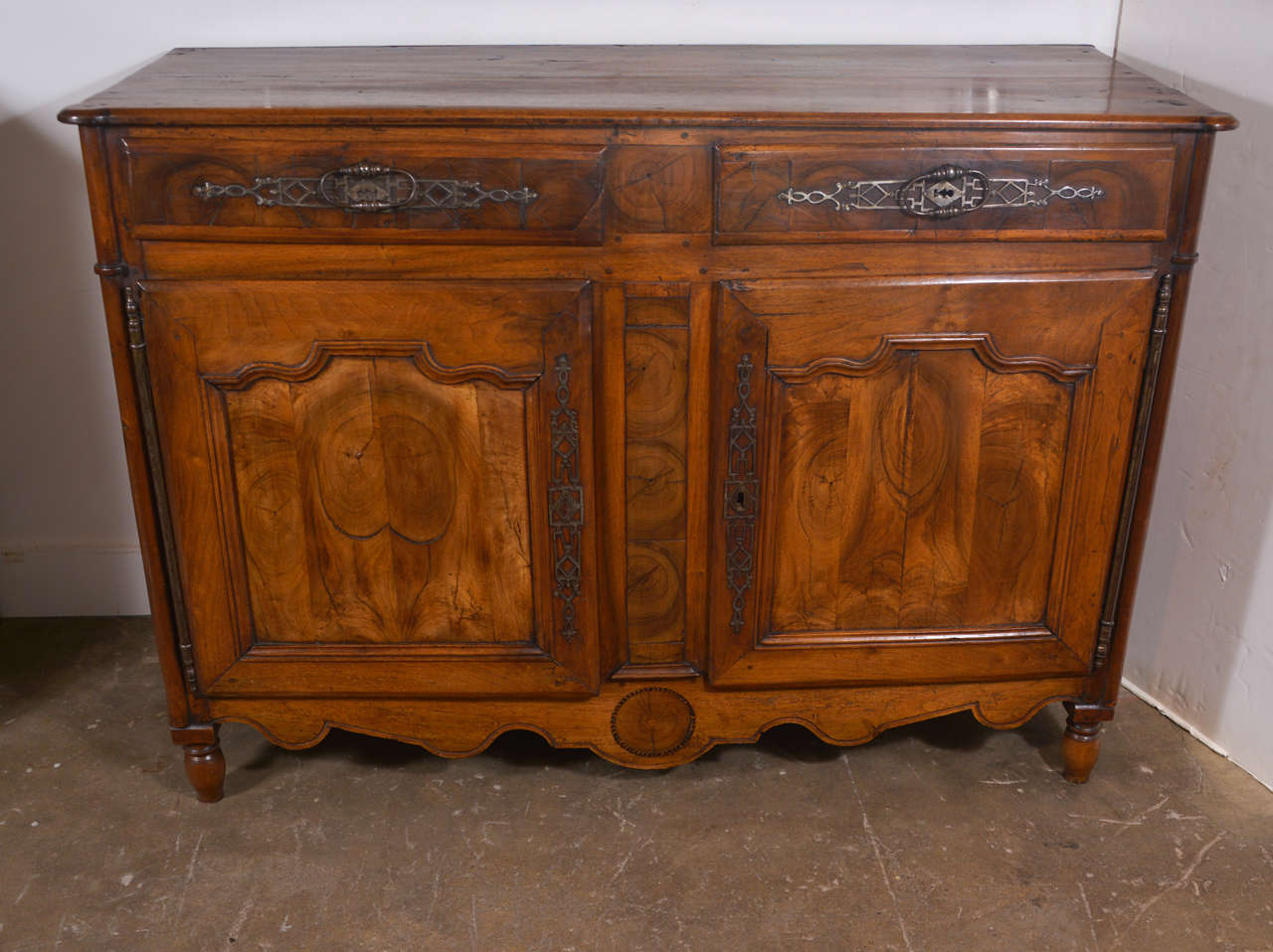 18th century French walnut buffet with oyster veneer and impressive pewter oversized hardware, circa 1780.