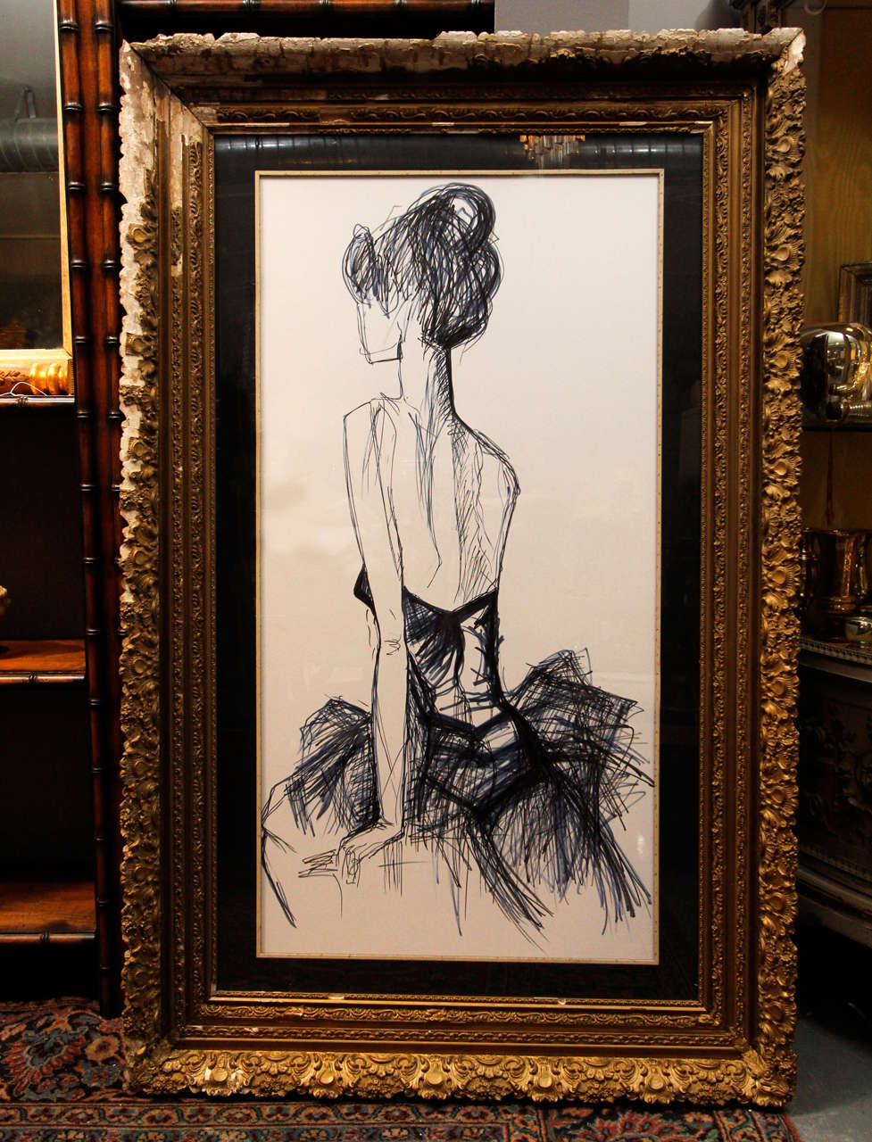 Beautiful oversize sketch in black and indigo of woman in evening gown in antique frame.