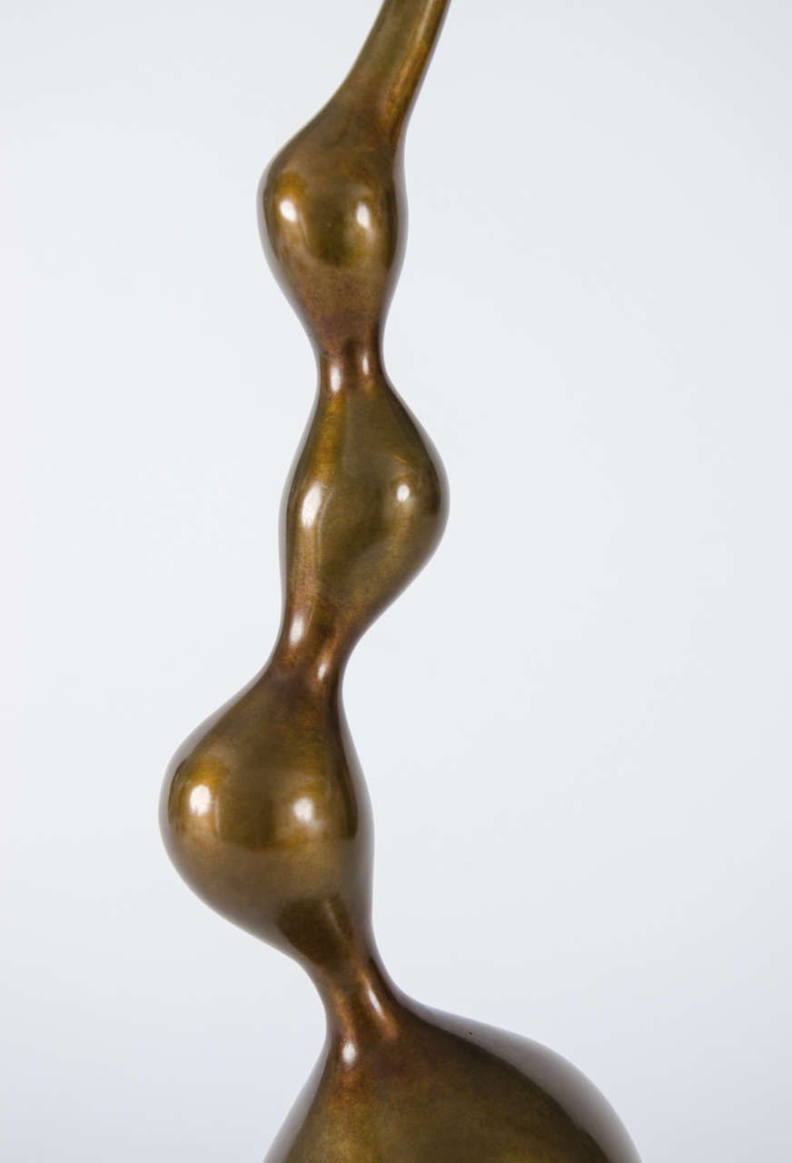 Cast Triple Balance, a unique patinated bronze sculpture by Vivienne Foley