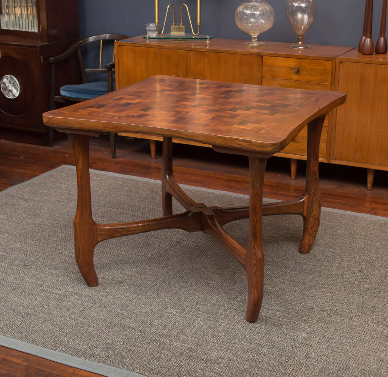 Don Shoemaker designed rosewood dining or games table. 
Made completely from solid rosewood in a sculptural organic manor.
Lightly refinished and in excellent vintage condition.
Price reduced from List $6800.00 to Net $4800.00