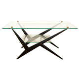 An Italian Iron and Two Tiered Glass Coffee Table.