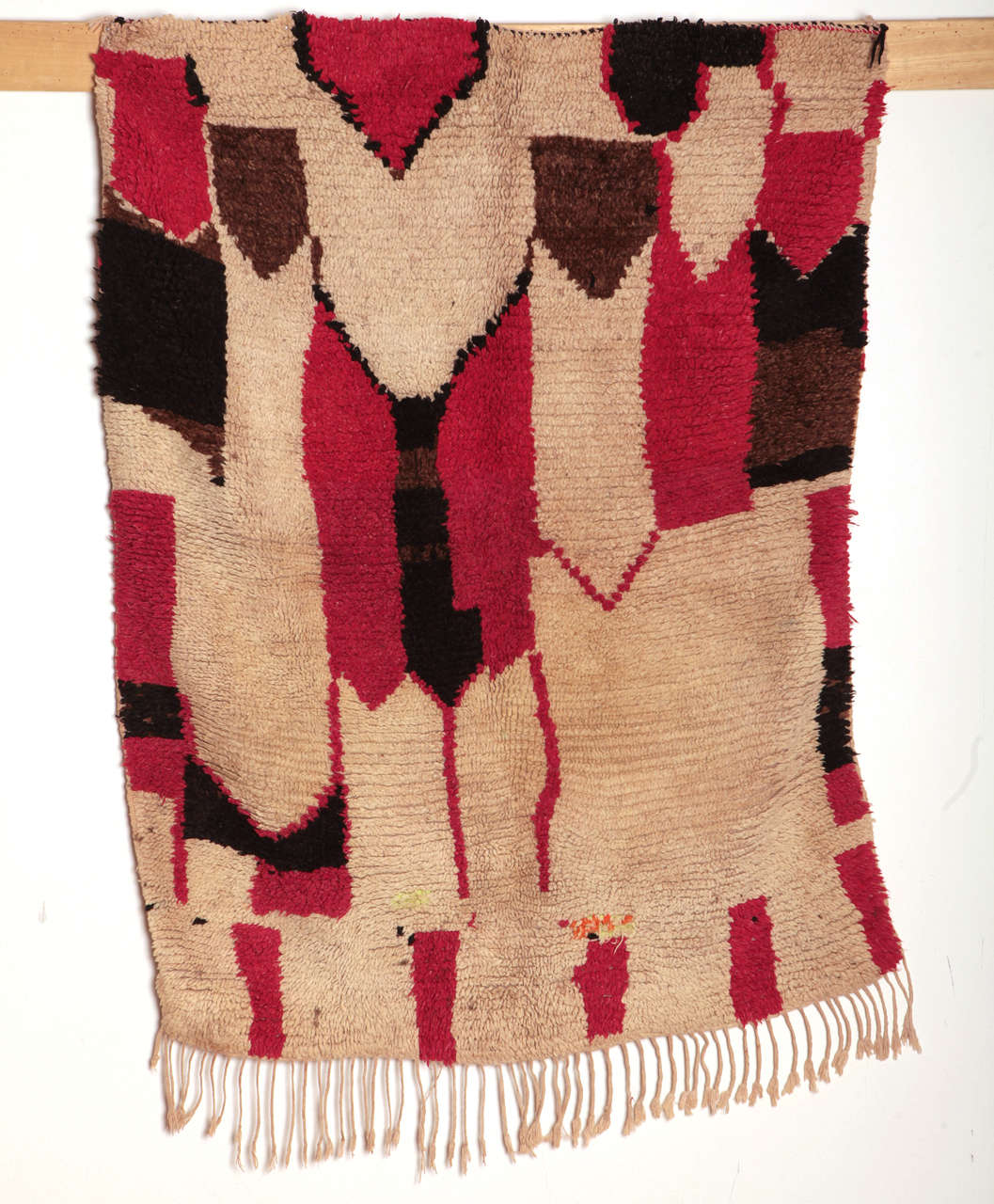 The Berber rugs from the Azilal region, located in the Moroccan Central High Atlas, are among the most Primitive North African tribal weavings. Their Minimalist designs are accentuated by a limited palette of strongly contrasting colours, like in