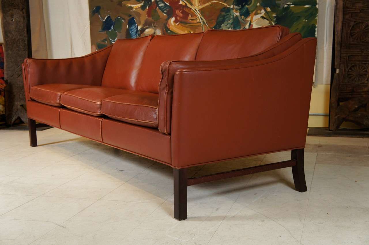 Three-seater sofa, mid-century Danish Modern, in medium brown leather, Borge Mogensen style.